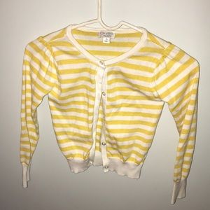 White and yellow sweater